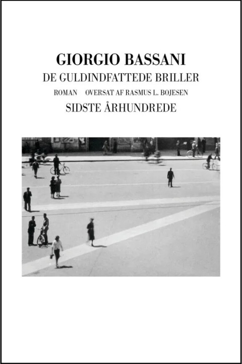 Omslag: De guldindfattede briller