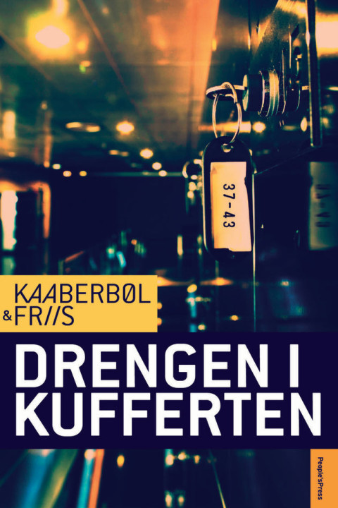 Omslag: Drengen i kufferten