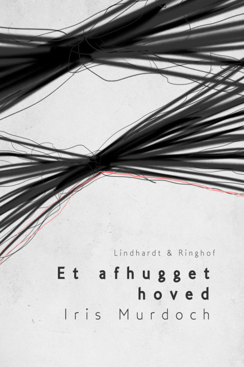 Omslag: Et afhugget hoved