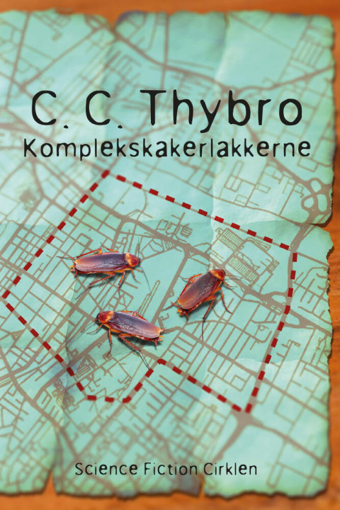 Omslag: Komplekskakerlakkerne