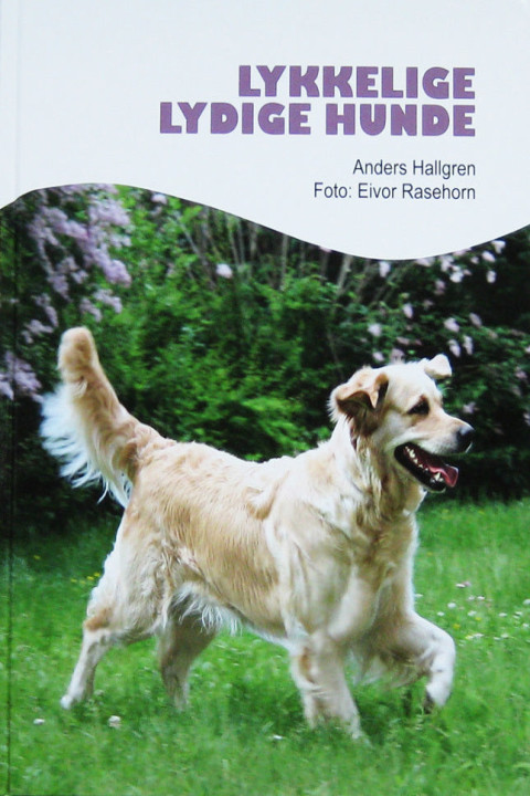 Omslag: Lykkelige lydige hunde