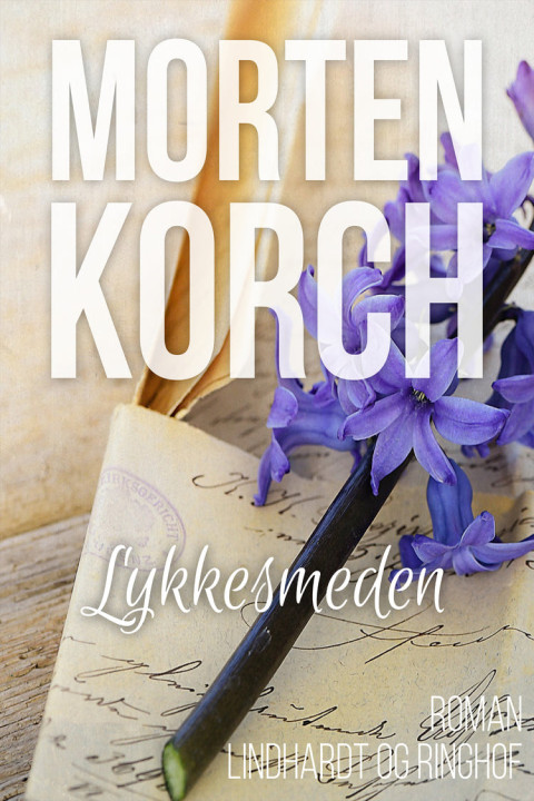 Omslag: Lykkesmeden