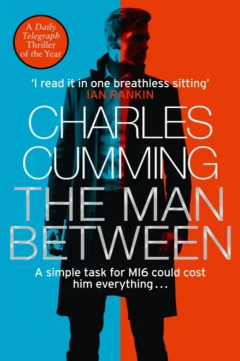 Omslag: MAN BETWEEN PB