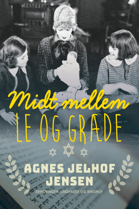 Omslag: Midt mellem le og græde